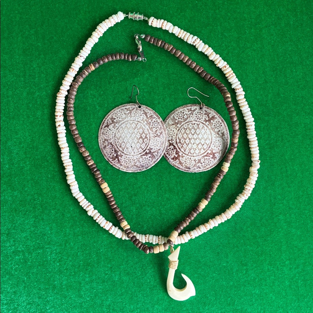 Moana inspired shell necklaces and metal earrings neutral tones island vacation